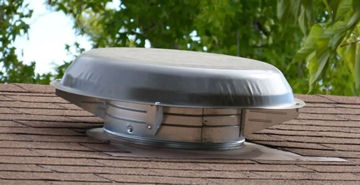 attic fan installation services with low-profile roof ventilation unit in Milwaukee, WI