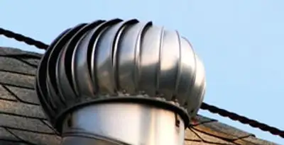 attic fan installation services with professionally installed roof ventilation unit in Milwaukee, WI