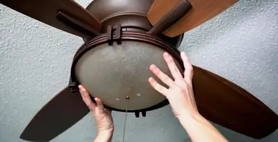 Ceiling fan repair and reinstallation on ceiling mount in Milwaukee, WI