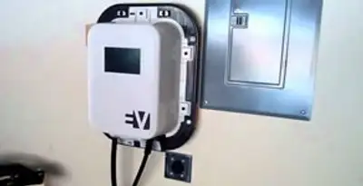 Electric car charger installation with wall-mounted EV charging station in Milwaukee, WI