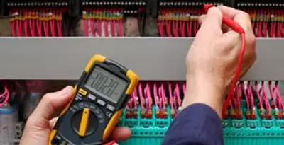 electrical service showing professional testing and troubleshooting of electrical panel by licensed electricians in Milwaukee, WI