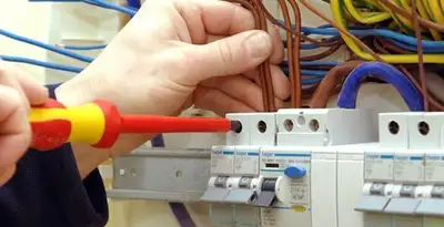 electrician services performing professional electrical panel wiring and connections in Milwaukee, WI