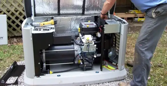 generator installation service showing technician connecting and configuring generator components in Milwaukee, WI