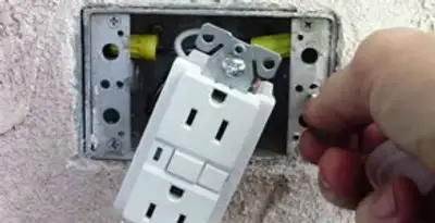 gfci circuits service showing installation of a ground fault circuit interrupter outlet by licensed electricians in Milwaukee, WI