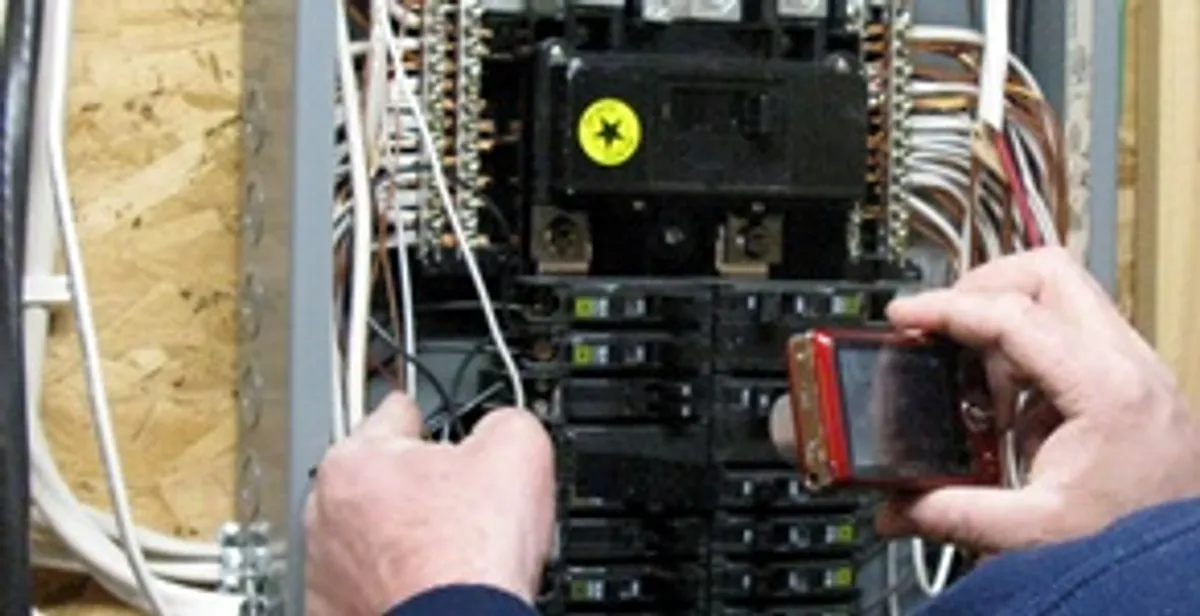 Home electrical inspection of circuit breaker panel by licensed electrician in Milwaukee, WI