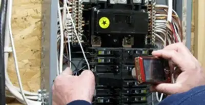Home electrical inspection of circuit breaker panel by licensed electrician in Milwaukee, WI
