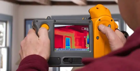 home energy audit service capturing thermal readings to analyze insulation and electrical efficiency in Milwaukee, WI