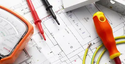 licensed electrician planning and testing electrical systems using professional tools in Milwaukee, WI