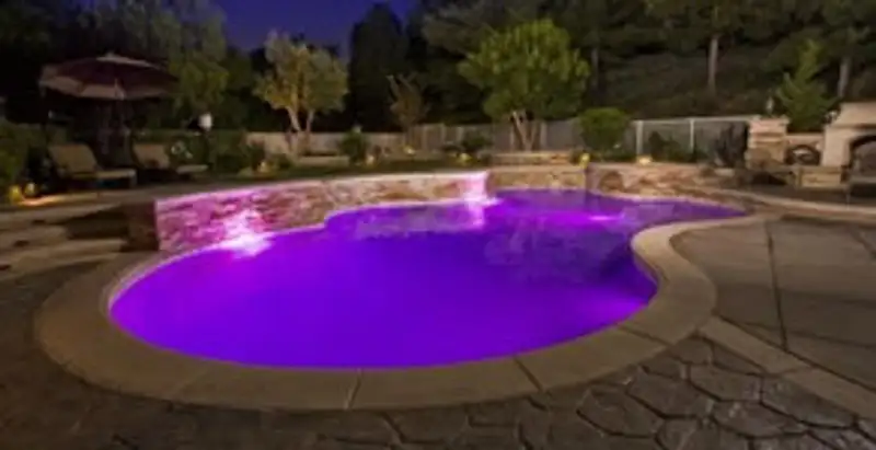pool light installation and repair services illuminating a residential swimming pool in Milwaukee, WI