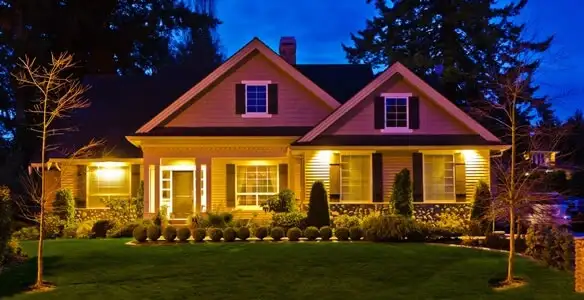 security light installation services illuminating a residential exterior at night in Milwaukee, WI