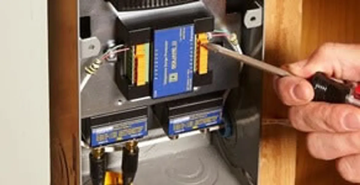 Whole home surge protection device being installed by a licensed electrician to protect electrical systems in Milwaukee, WI