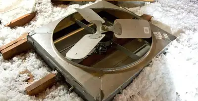 whole house fan installation services with attic-mounted ventilation unit in Milwaukee, WI