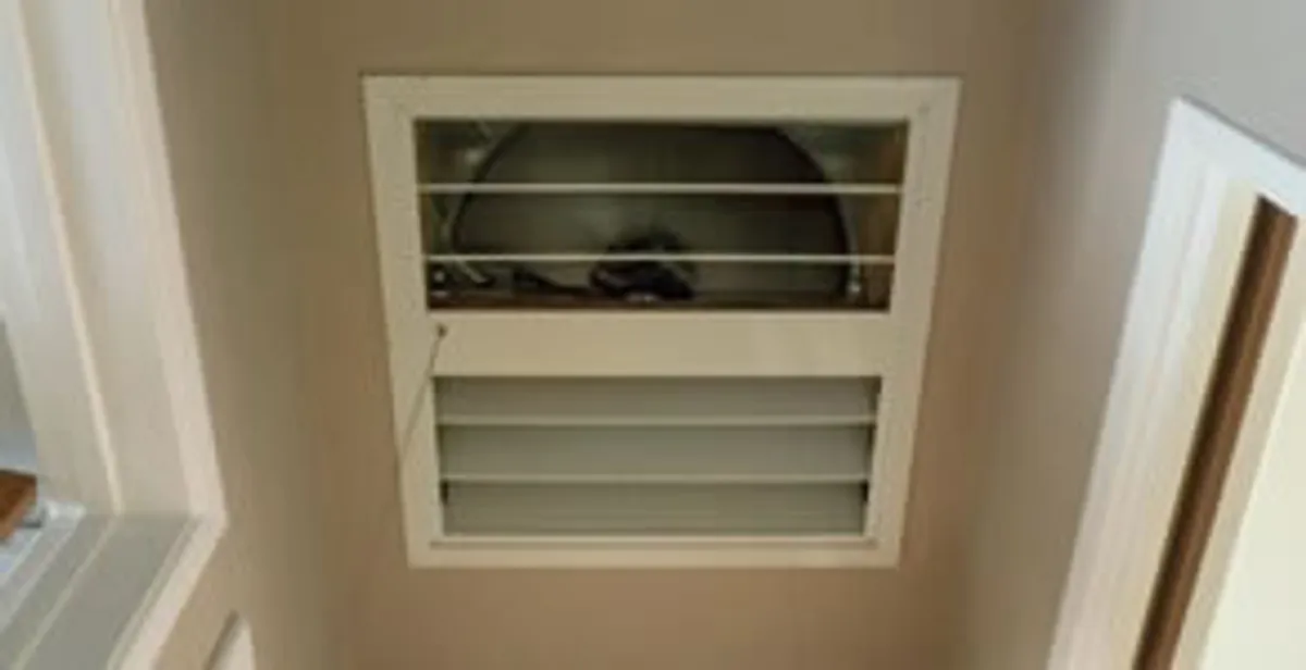 whole house fan installation services with ceiling-mounted ventilation system in Milwaukee, WI