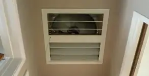 whole house fan installation services with ceiling-mounted ventilation system in Milwaukee, WI